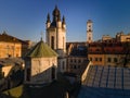 aerial view of sunset above old european city. church bell tower Royalty Free Stock Photo