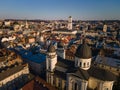 aerial view of sunset above old european city. church bell tower Royalty Free Stock Photo