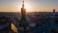 aerial view of sunset above old european city. church bell tower Royalty Free Stock Photo