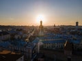 aerial view of sunset above old european city. church bell tower Royalty Free Stock Photo