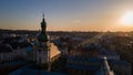 aerial view of sunset above old european city. church bell tower Royalty Free Stock Photo