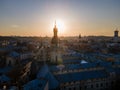 aerial view of sunset above old european city. church bell tower Royalty Free Stock Photo