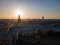 aerial view of sunset above old european city. church bell tower Royalty Free Stock Photo