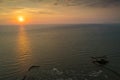 Aerial view of sunset above sea by Karpen beach in Albania, Summer 2022