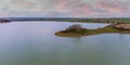 An aerial view at sunset across the eastern side of Eyebrook reservoir, Leicestershire