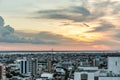 View over the city of Manaus at sunset with Rio Negra bridge in background in Amazon region of Brazil, South America