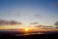 Aerial view sunset over the forest and lake. Top view. View from drone. Aerial top view cloudscape. Texture of clouds. View from a Royalty Free Stock Photo