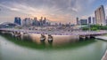 Aerial view of sunset over Helix Bridge and Bayfront Avenue with traffic timelapse at Marina Bay, Singapore Royalty Free Stock Photo