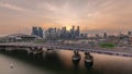 Aerial view of sunset over Helix Bridge and Bayfront Avenue with traffic timelapse at Marina Bay, Singapore Royalty Free Stock Photo