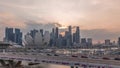 Aerial view of sunset over Helix Bridge and Bayfront Avenue with traffic timelapse at Marina Bay, Singapore Royalty Free Stock Photo