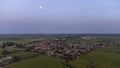 An aerial view of sunset over the village of West Winch near Kings Lynn in Norfolk