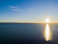 Aerial view of a Sunset sky background. Aerial Dramatic gold sunset sky with evening sky clouds over the sea. Stunning sky clouds Royalty Free Stock Photo