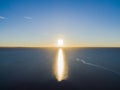 Aerial view of a Sunset sky background. Aerial Dramatic gold sunset sky with evening sky clouds over the sea. Stunning sky clouds Royalty Free Stock Photo