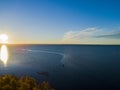 Aerial view of a Sunset sky background. Aerial Dramatic gold sunset sky with evening sky clouds over the sea. Stunning sky clouds Royalty Free Stock Photo