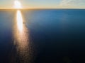 Aerial view of a Sunset sky background. Aerial Dramatic gold sunset sky with evening sky clouds over the sea. Stunning sky clouds Royalty Free Stock Photo