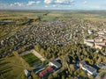 Aerial view of surburban houses in Joniskis, Lithuania. Autumn sunset. Royalty Free Stock Photo