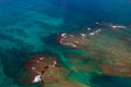 Aerial view of surf and shoals in the Pacific Ocean Royalty Free Stock Photo
