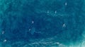 Aerial view of Surfer swimming on board near huge blue ocean wave Royalty Free Stock Photo