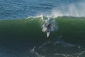 Aerial view of a surfer on the wave.