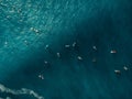 Aerial view with surfers and wave in crystal ocean. Top view Royalty Free Stock Photo