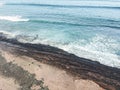 Aerial view of surfers in the waves of the Atlantic  ocean. Sandy beach. Panorama background shot on a drone. Selectivity focus Royalty Free Stock Photo