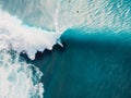 Aerial view of surfing at barrel waves. Blue wave in ocean and surfers Royalty Free Stock Photo