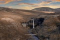 Aerial view of Svartifoss waterfall surrounded by basalt columns during sunset Royalty Free Stock Photo