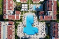 Aerial View Of swimming pool in hotel resort. Turkish Riviera. Side, Mediterranean Sea Coast, Antalya, Turkey drone photo Royalty Free Stock Photo