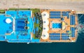 Aerial view of swimming pool, sunbeds, umbrellas on cruise ship Royalty Free Stock Photo