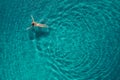 Aerial view of swimming woman in mediterranean sea Royalty Free Stock Photo