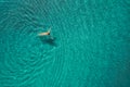 Aerial view of swimming woman in mediterranean sea Royalty Free Stock Photo