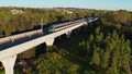 Aerial view of a Sydney Metro train going past