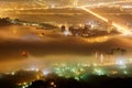 Aerial view of Taipei on a foggy evening, the vibrant capital city of Taiwan, with colorful lights of buildings Royalty Free Stock Photo