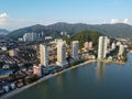 Aerial view tall condominium at sea coastal during sunny day
