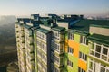 Aerial view of a tall residential apartment building with many windows and balconies Royalty Free Stock Photo