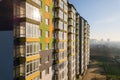 Aerial view of a tall residential apartment building with many windows and balconies Royalty Free Stock Photo