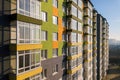 Aerial view of a tall residential apartment building with many windows and balconies Royalty Free Stock Photo