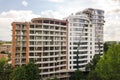 Aerial view of tall residential apartment building under construction. Real estate development Royalty Free Stock Photo