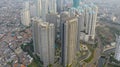 Aerial view of Taman Anggrek the biggest shopping mall and apartment in Jakarta when sunrise. Jakarta, Indonesia, August 22, 2021