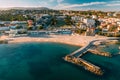 Aerial view of Tamariz Beach with Casino Estoril in the end of the garden and Hotel Palacio on Royalty Free Stock Photo