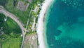 Aerial view of Tanjung Aan, Tropical island with sandy beach and turquoise ocean with waves. Lombok. Indonesia, Mach 22, 2022 Royalty Free Stock Photo