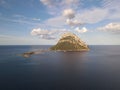 Aerial view of Tavolara Island, lagoon, Porto Taverna Beach in Sardinia, Italy on clear sunny day. Royalty Free Stock Photo