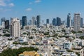 Aerial view of Tel Aviv City with modern skylines and luxury hotels against blue sky at the beach near the Tel Aviv port in Israel Royalty Free Stock Photo