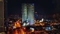 Aerial view on Tel-Aviv. Urban night city never stops. Luxury building and tall business towers Royalty Free Stock Photo