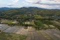 Aerial view of terraced rice field and mountains in harvest season at Chiang mai, Thailand Royalty Free Stock Photo