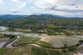 Aerial view of terraced rice field and mountains in harvest season at Chiang mai, Thailand Royalty Free Stock Photo