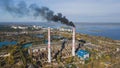 Aerial view of thermoelectric plant with chimneys in a rural autumn landscape, Trypillya