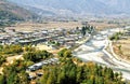 Aerial view of Thimphu City with Bhutanese traditional style houses near a river in Paro, Bhutan