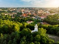 Aerial view of the Three Crosses monument overlooking Vilnius Old Town on sunset. Vilnius landscape from the Hill of Three Crosses Royalty Free Stock Photo