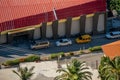 Aerial view of three different cars parked near a shopping centre in Alany, Turkey